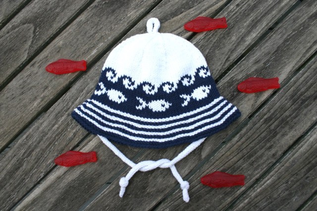 Baby's sunhat knit in sport weight or DK cotton yarn from Kidsknits.com. PDF thru Ravelry.