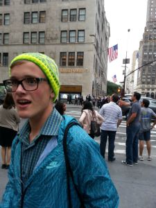 Teen wears NY Nordic Hat knit in neon Dale Freestyle yarn